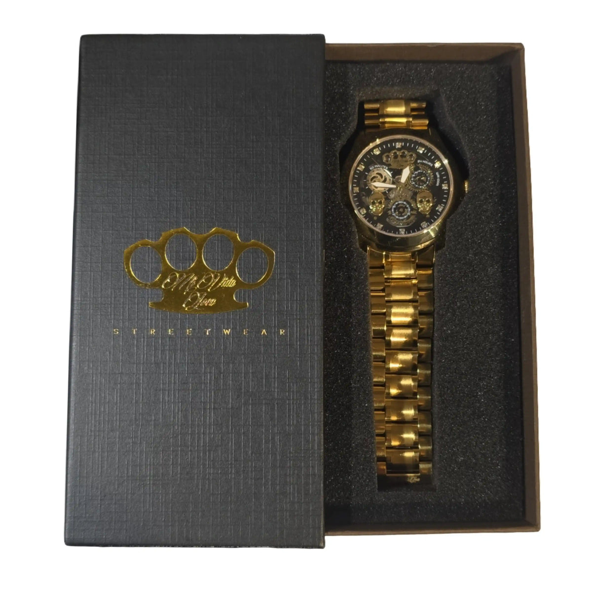 Goud-gouden MVL Double skull horloge in de geopende zwarte giftbox met gouden MVL logo